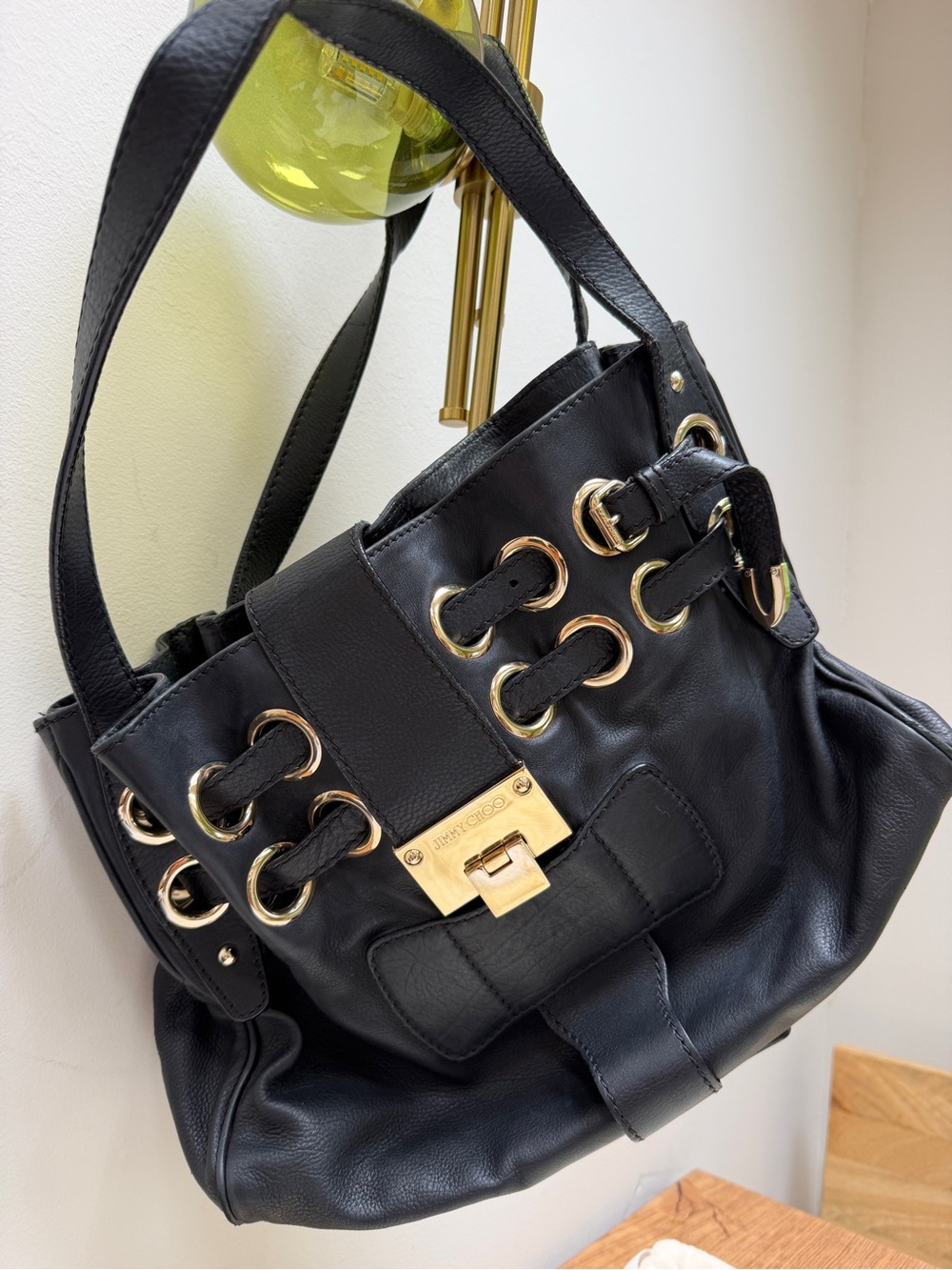 Jimmy Choo Black Leather Shoulder Bag with Gold-Tone Hardware and Grommet Detail